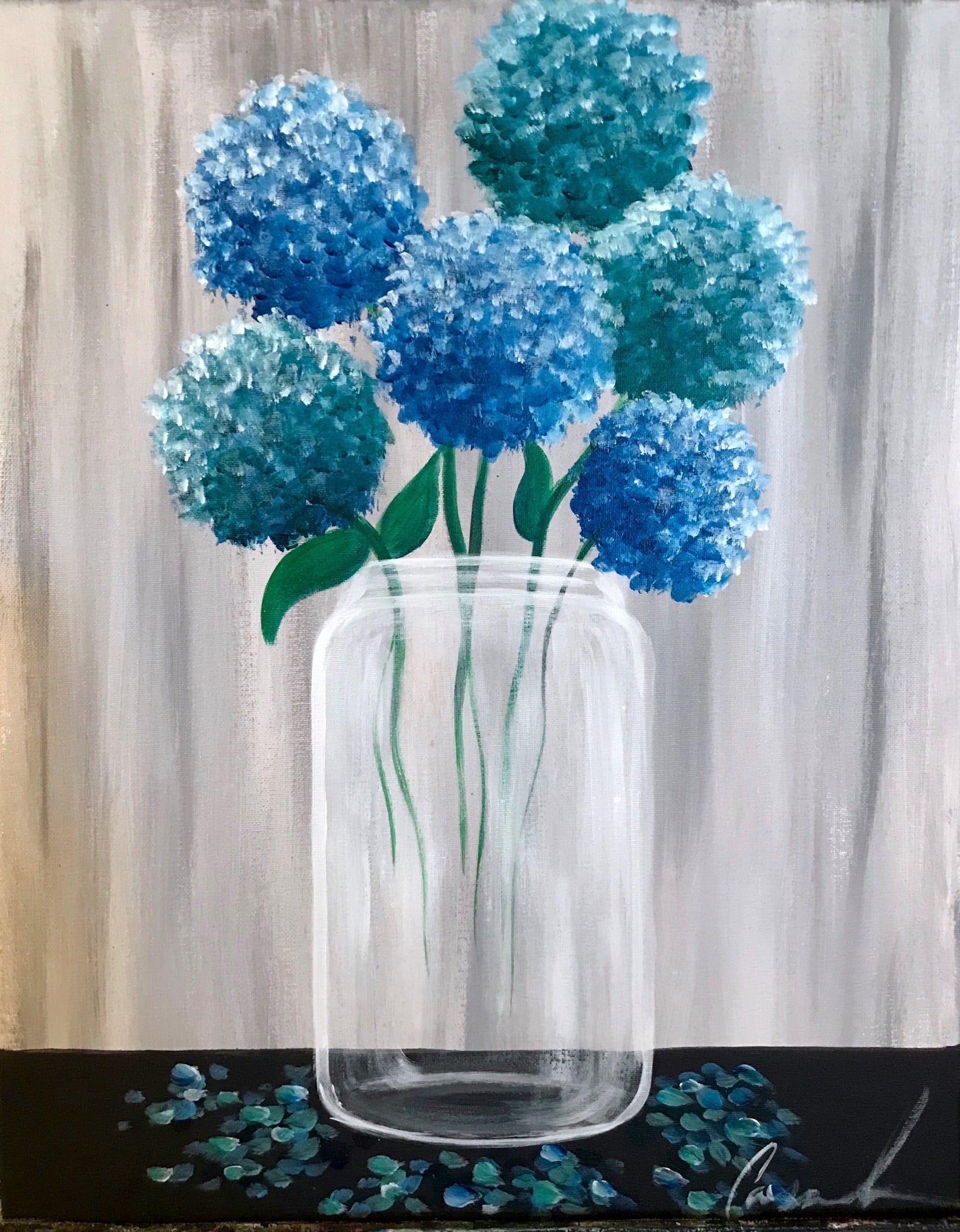 Blue hydrangeas in a mason jar painted on canvas at a Paint and Sip Party, with soft rustic background and scattered petals.