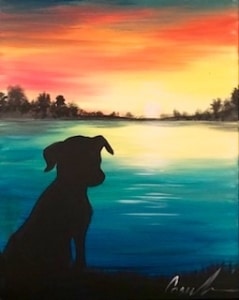 A dog’s silhouette sits beside a glowing lake at sunset, painted during a heartwarming Paint & Sip Party.