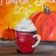 Painting titled Pumpkin Spice Life featuring a red mug of whipped cream latte with pumpkins in the background on a warm autumn gradient.