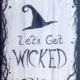 Painting titled Let’s Get Wicked featuring a bold witch hat and lettering, inspired by the upcoming Wicked: For Good movie.