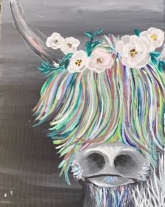 Highland Cow painting with rainbow hair and floral crown created at a Toledo Paint & Sip Party