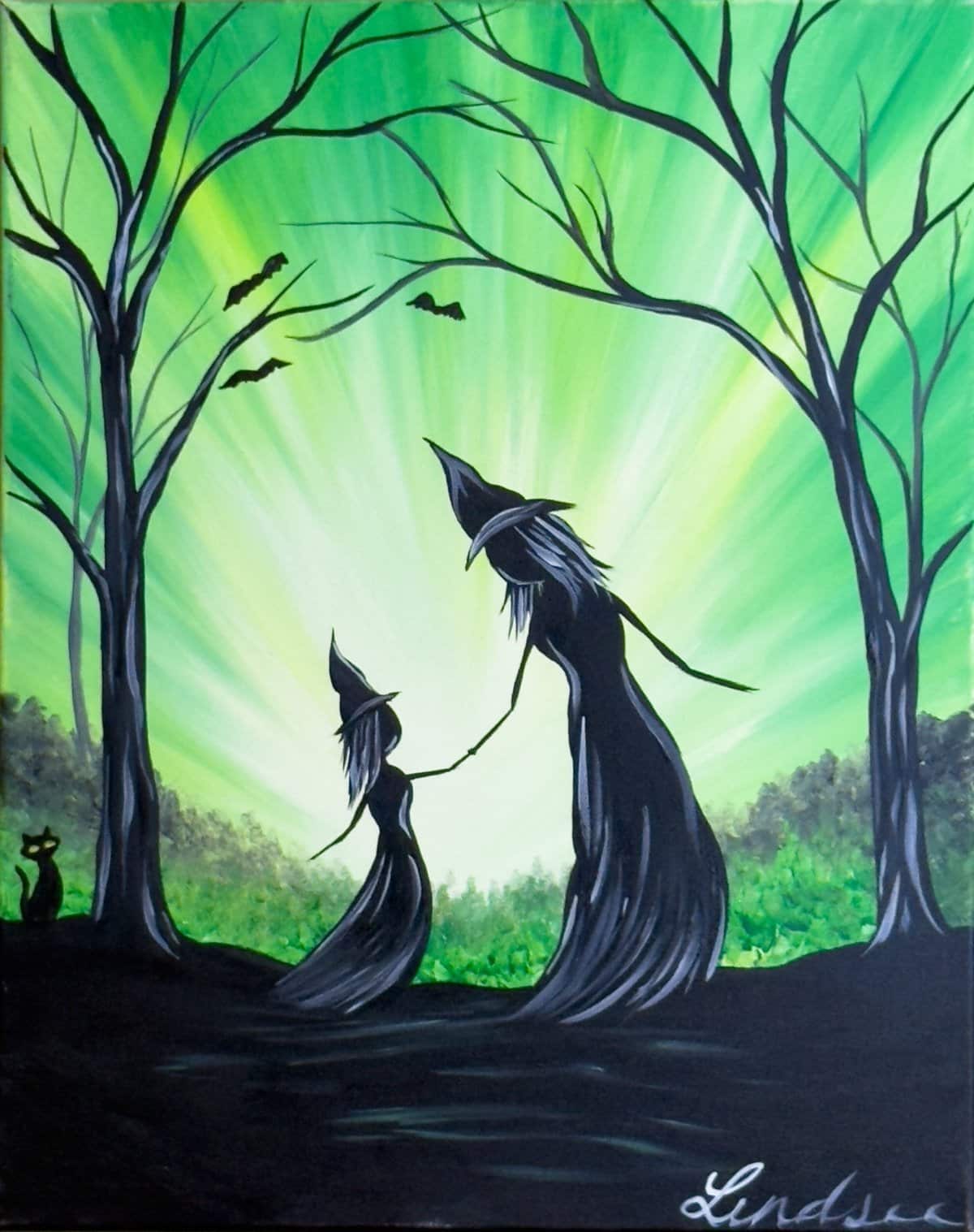 Two witches holding hands in a glowing green forest with bats and a cat – Witches painting at Wine & Canvas Toledo