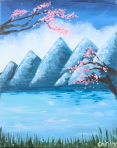 Peaceful spring landscape painting with blue mountain peaks, calm water, and pink cherry blossoms drifting from tree branches