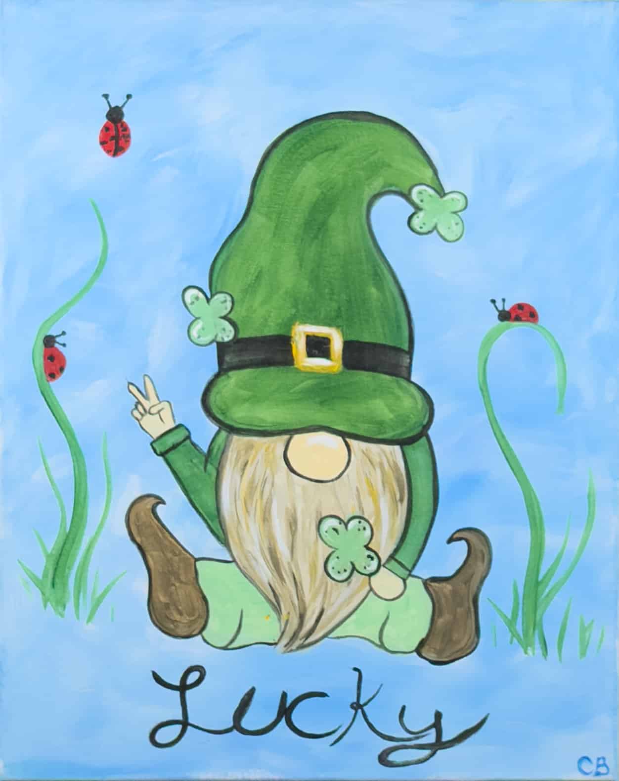St Patrick’s Day gnome painting with green hat, shamrocks, ladybugs, and the word Lucky on a blue background