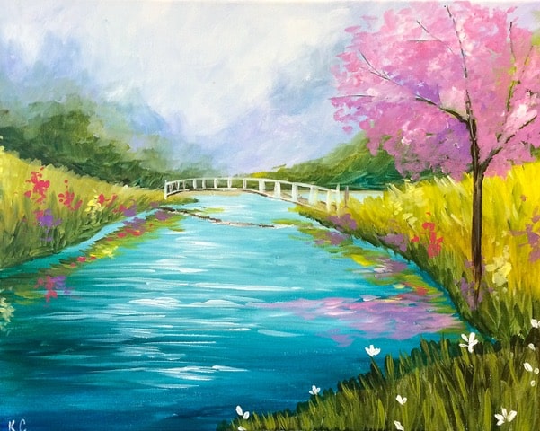 Colorful spring landscape with a flowing river, white bridge, blooming flowers, and a pink tree