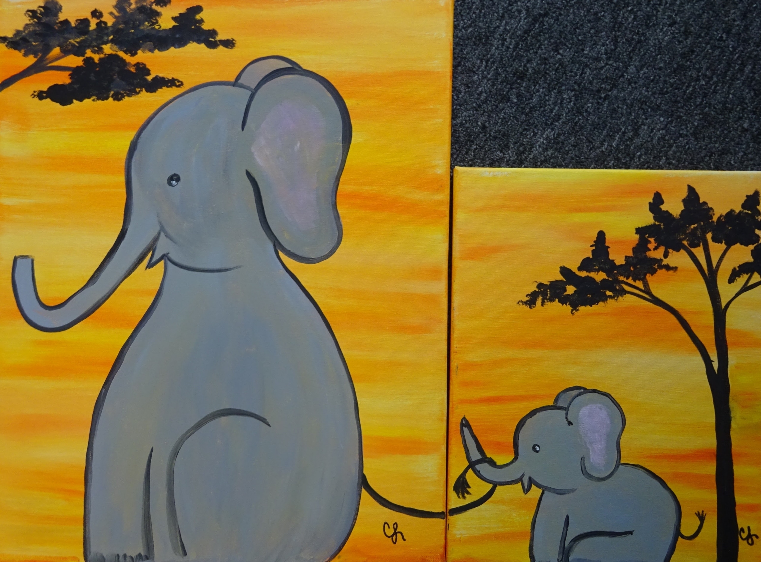 Mommy and child elephant paintings on two canvases forming one connected sunset scene with silhouetted trees