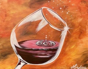 Tilted wine glass with red wine splash and ripple effect on a warm orange background painting