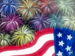 Colorful fireworks bursting above an American flag against a dark night sky